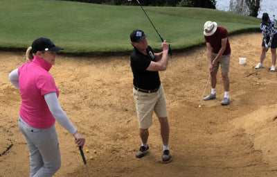 Anne Rollo coaching a group in a bunker