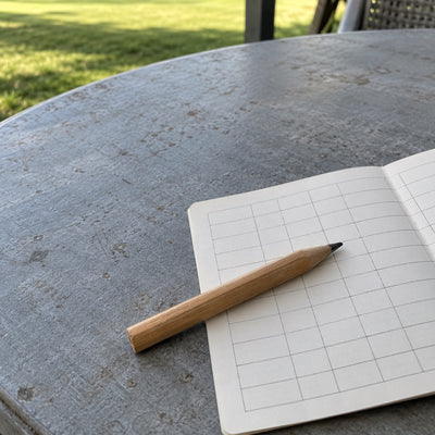 Practice notebook and pencil